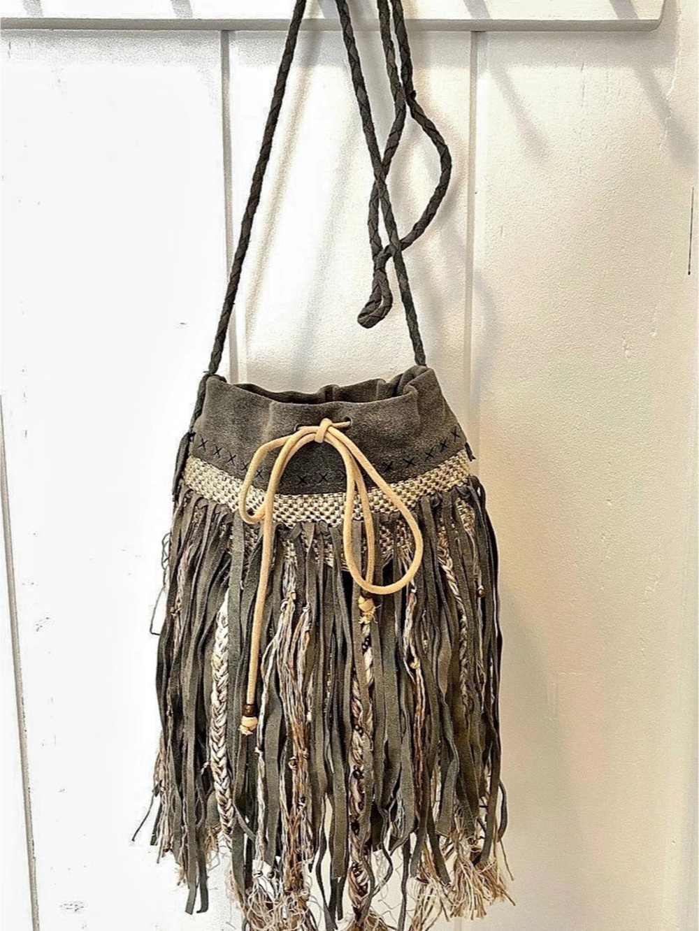 Free People Fringe Shoulder Bag in Gray & Beige
Suede and woven texture.